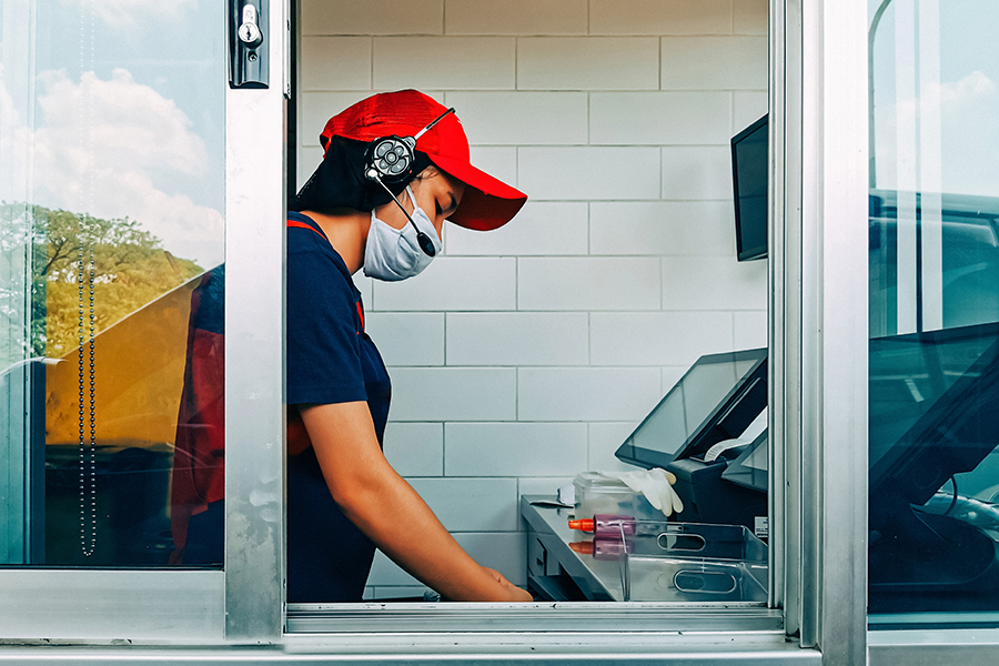 Bangkok, Thailand - May 28, 2020 : fast food cashier in drive th